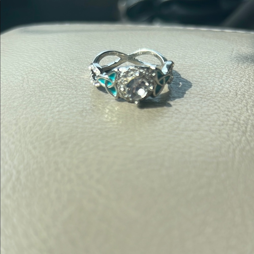 Elegant Silver and Blue Infinity Ring